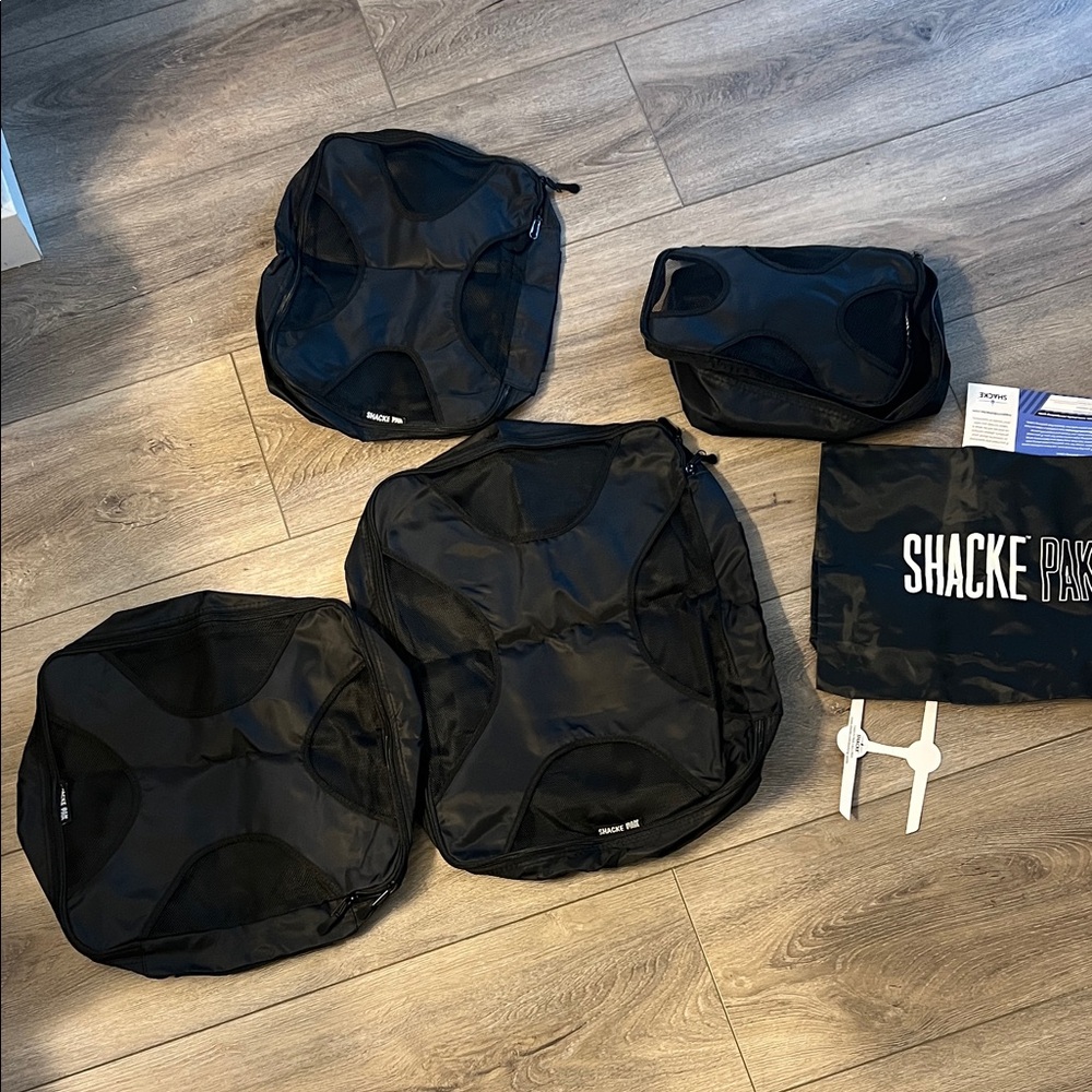 NWT shacke pak 4 piece Black Packing Cubes Set + bag